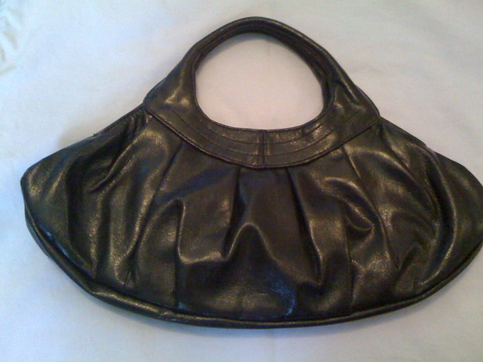Black patent leather handbag.