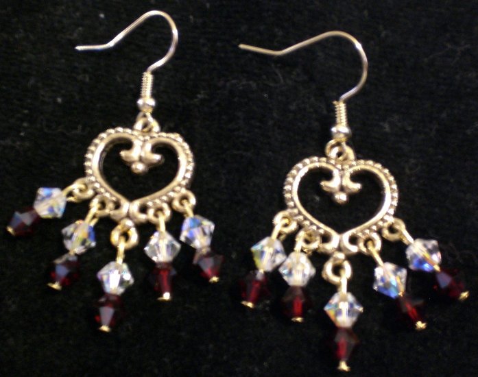 Chandelier earrings made with genuine Swarovski crystals in siam satin and crytal clear AB
