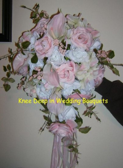 pink rose and white rose with calla lily wedding bouquet