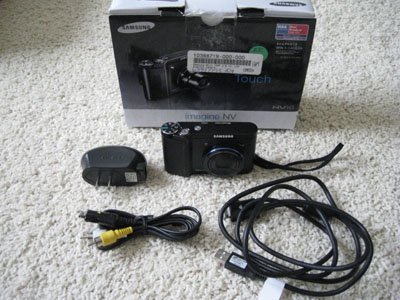 Samsung NV10 10.1MP Digital Camera 3x Opt Touch Pad GUI