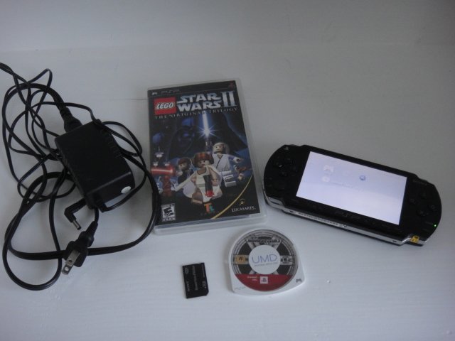 Sony Playstation PSP 1001 with 2 games and 1GB memory stick FW 5.51