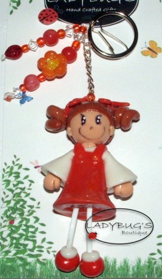 OOAK Handcrafted zipper pull Girl with curly hair and orange dress