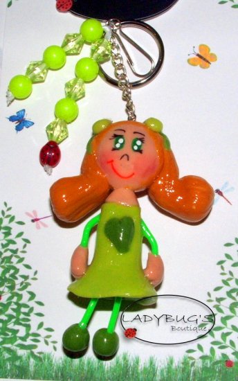 Unique Handcrafted zipper pull - Blonde Girl with pig tails, green dress