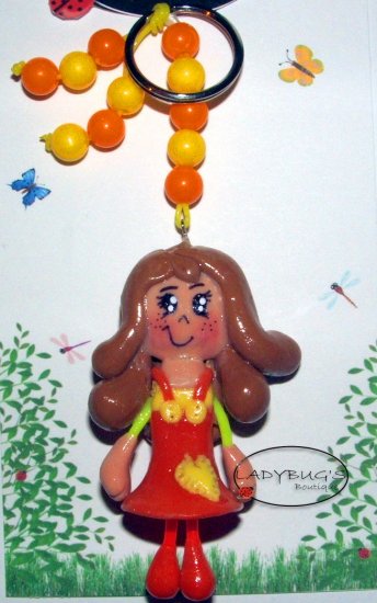 Unique Handcrafted zipper pull - Girl with orange and yellow dress