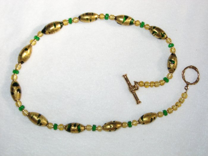 Green and gold glass beads
