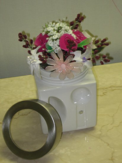 flowers arranged in a sugar jar
