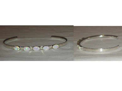 Cute sterling silver bracelet adorned with pretty opal