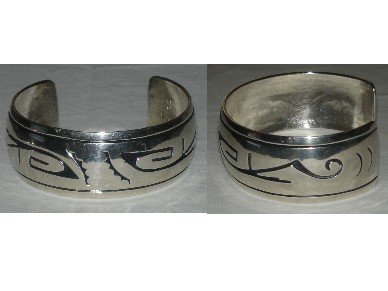 Sterling silver bracelet adorned with amazing OVERLAY navajo designs