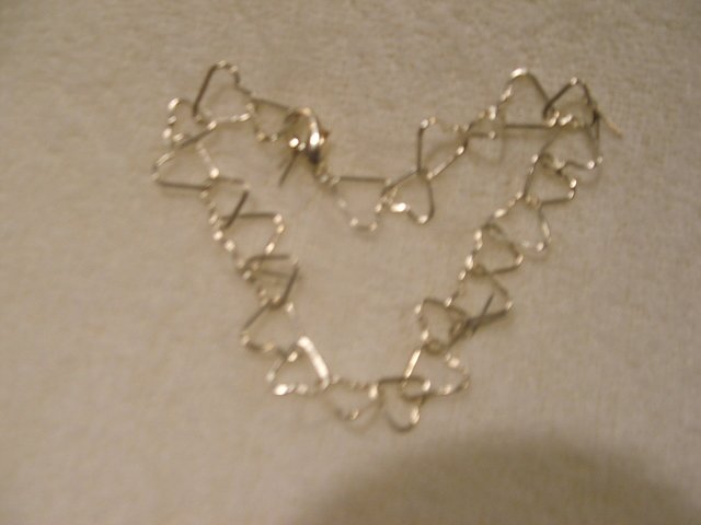 Silver toned Hearts Bracelet