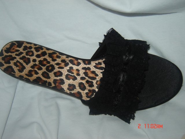 Black Cheetah flip flops