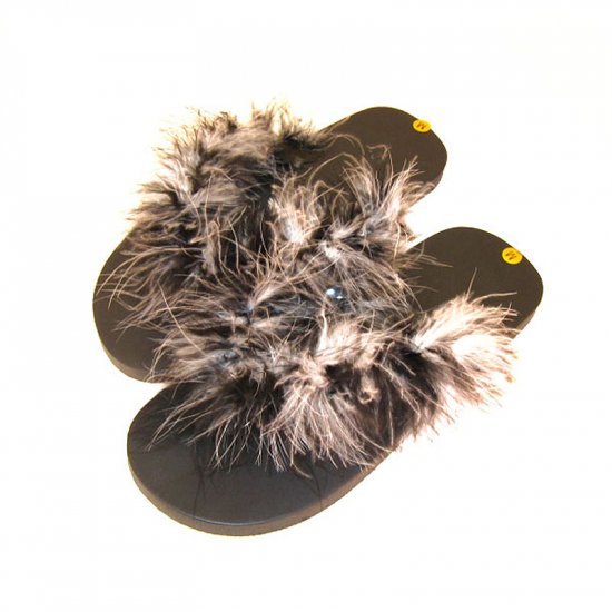 Black and white feathered flip-flops.