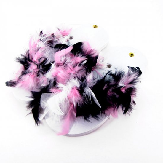Pink, black, and white feathered flip-flops.