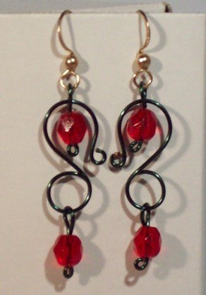 green S with read beads