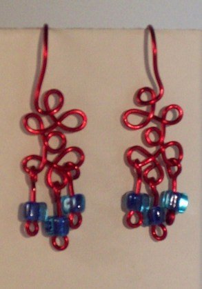 red loops with beads