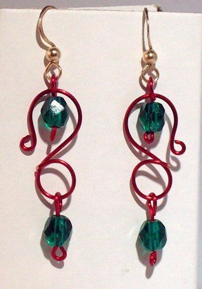 red S with green stones