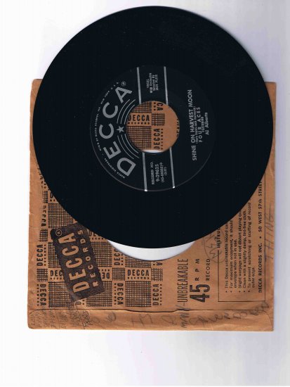Four Aces 45rpm single, "Love Is a Many Splendored Thing" b/w "Shine On Harvest Moon"