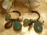 Brass set earrings with dangling natural colored gems-82289
