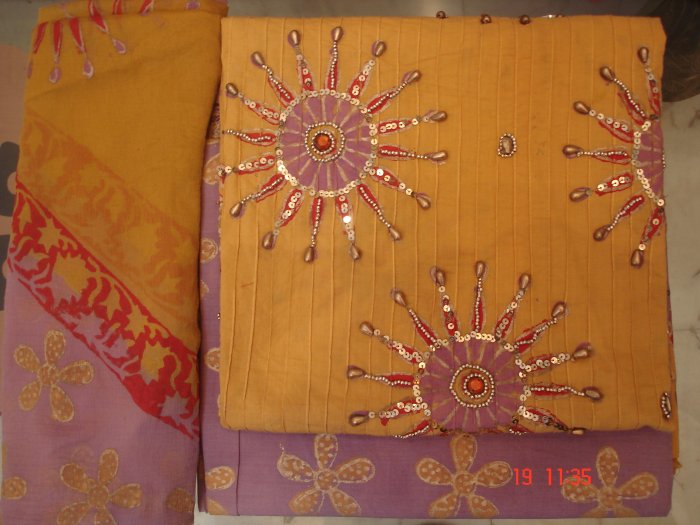 T-206: Lavender Colored Salwar & Kameez with heavy Sequence Work