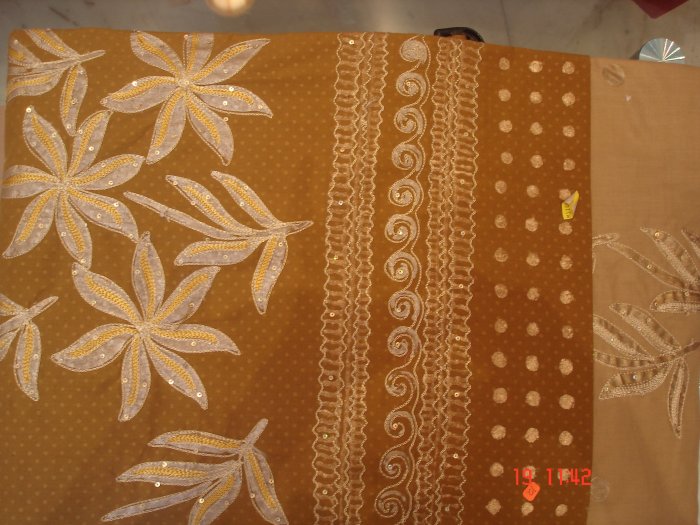 T-369: Light Brown Salwar Kameez with floral design and thread work