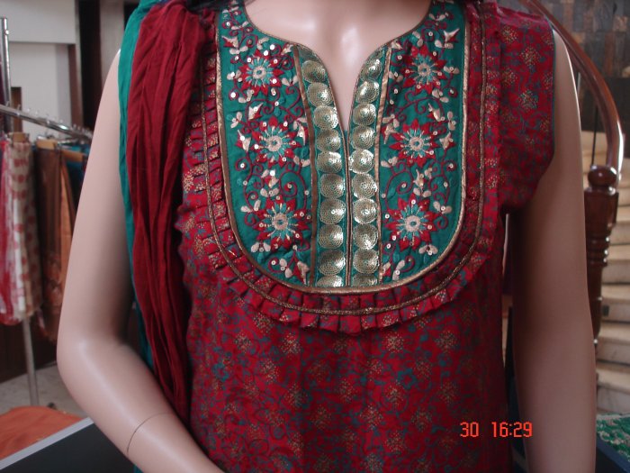 T-489: Maroon with green and golden print ready made suit