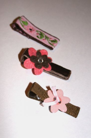 Set of three pink and brown alligator clips