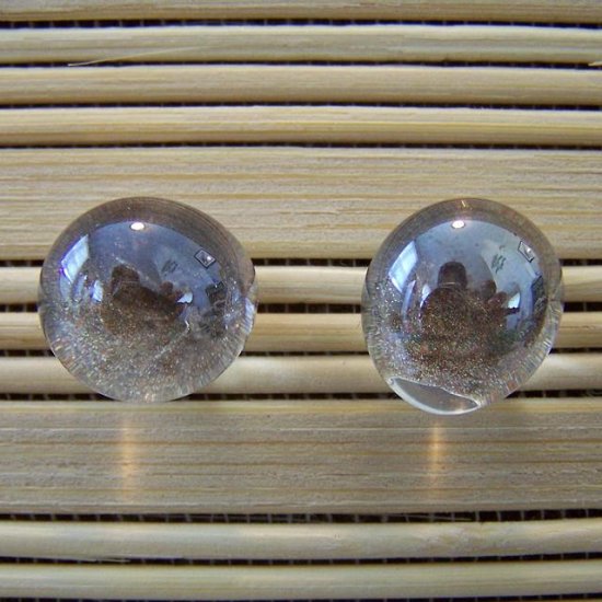 glass with taupe stud earrings