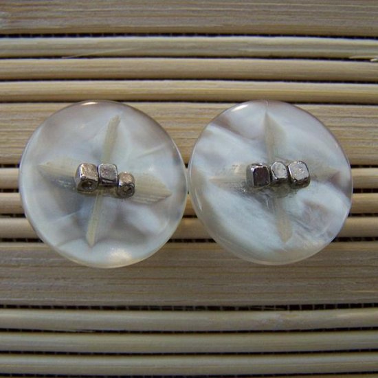 pearly white with silver stud earrings