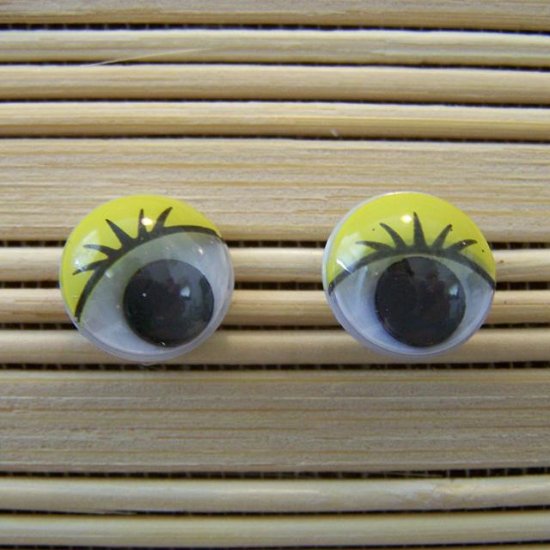 yellow eyelid wigglie eye stud earrings