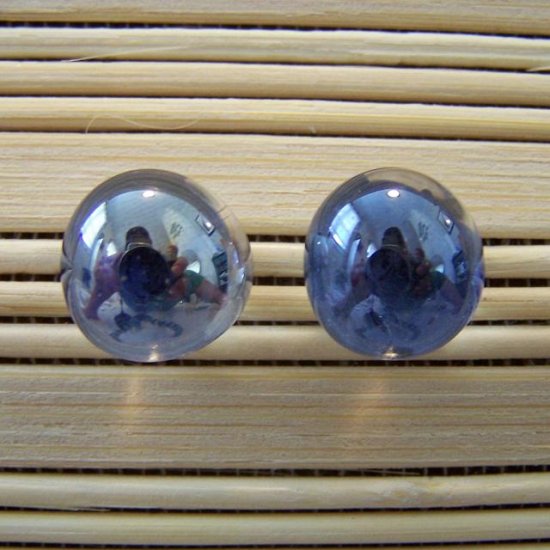 glass with navy stud earrings