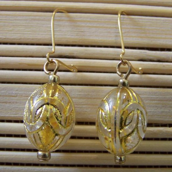 gold egg dangle earrings