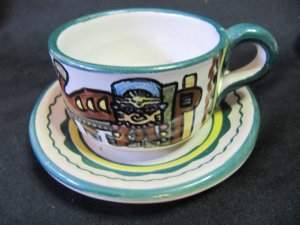 Vintage F.C.A. Peru Handpainted Inca Animal and Mask Design Green Rim Cup and Saucer