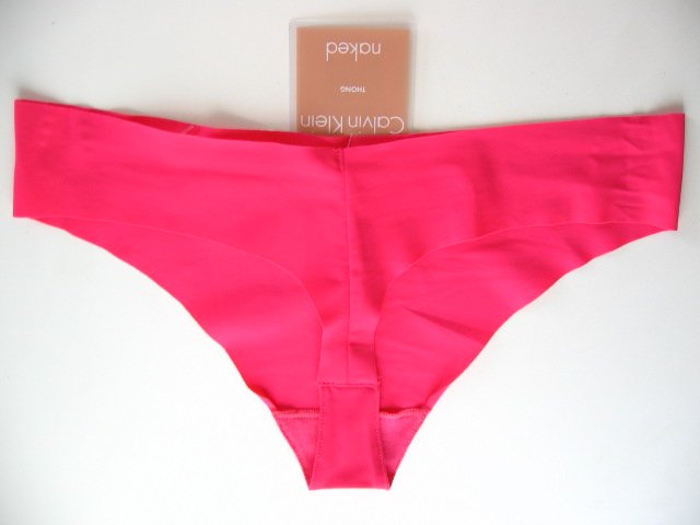 6U0086 CALVIN KLEIN FUCHSIA NAKED UNFINISHED EDGE THONG F2636-57A, SIZE MEDIUM