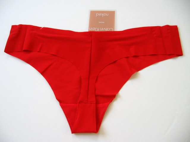 A0256 CALVIN KLEIN DEEP RED NAKED UNFINISHED EDGE THONG F2636- 43A, SIZE MEDIUM