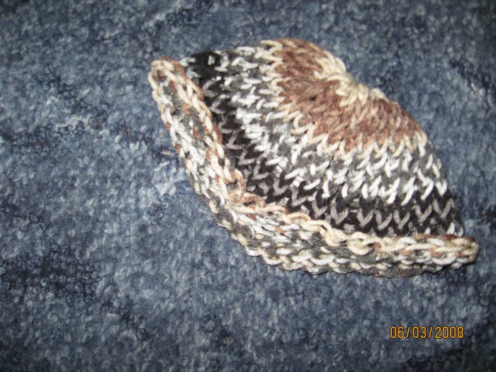 Child's dark camo roolup knit hat