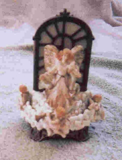 Angels' window musical statue