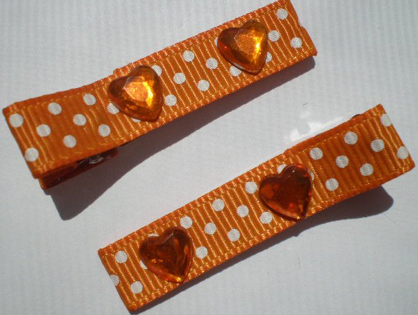 Orange/white Polkadots Ribbon with Heart shaped Rhinestones Clippies
