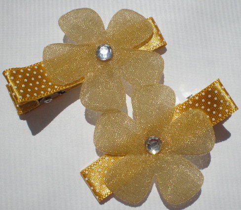 Gold/White Polkadots Ribbon with Gold glittered Flower Clippies