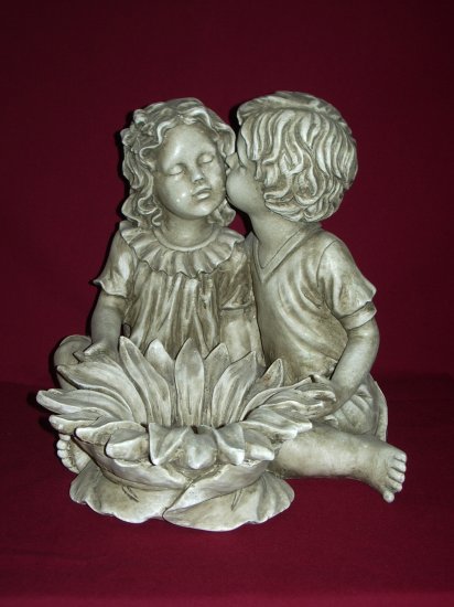 Boy and Girl With Flower Statue