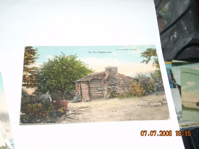 vintage postcard north carolina log house
