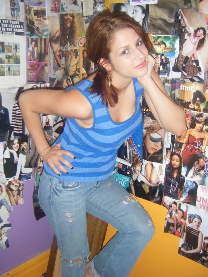 blue knit sleeveless shirt