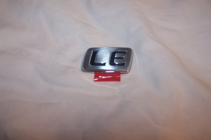 Toyota Corolla trunk emblem "LE"