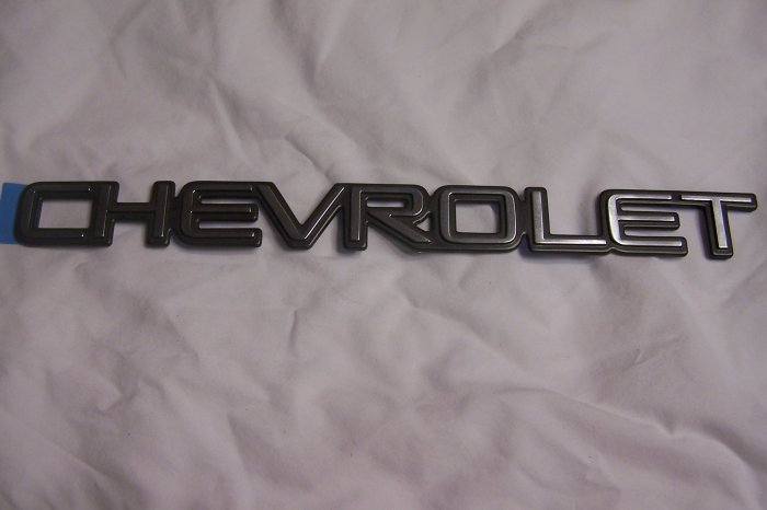 Chevy rear door emblem "chevrolet"