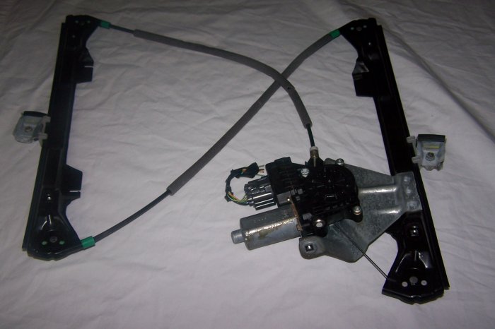 Jaguar Front drivers door window motor and reg.