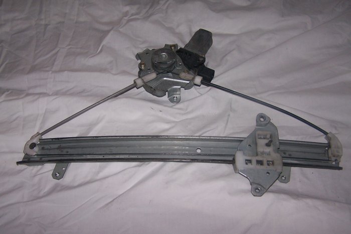mitsubishi lancer front passside window track/motor