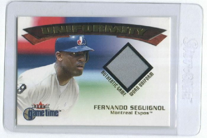 2001 FLEER GAME TIME UNIFORMITY FERNANDO SEGUIGNOL EXPOS GAME WORN UNIFORM CARD