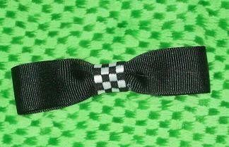 Super cute black and checkerboard bow