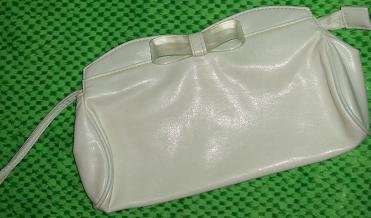 Cute white mini purse with zipper and magnet closure