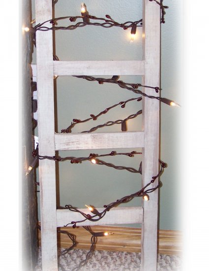 Prim Ladder w/ lights & berries