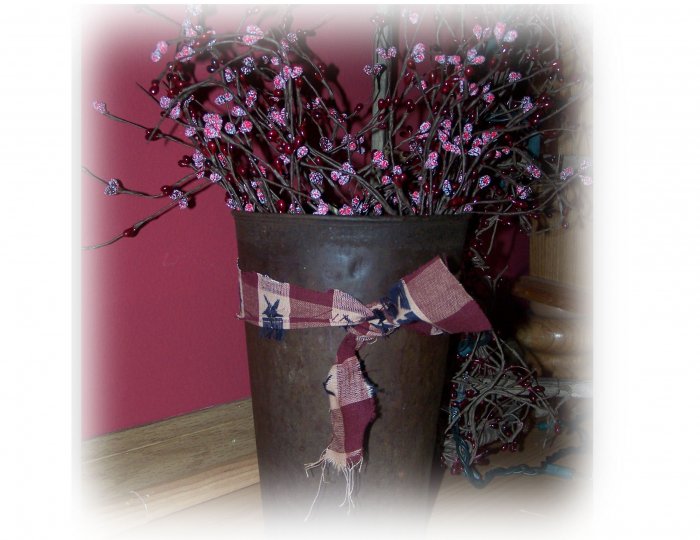 Antique maple syrup bucket with berries