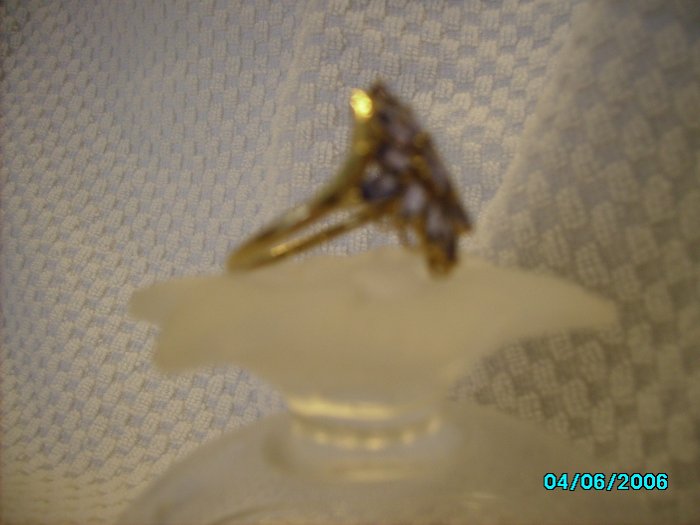 Ladies 10 KT gold tanzanite cluster ring